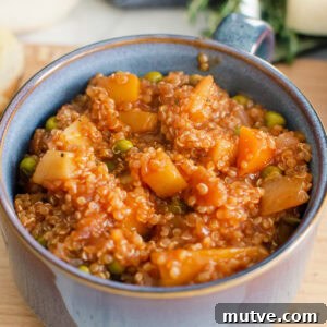 Quinoa Vegetable Stew served in a blue bowl