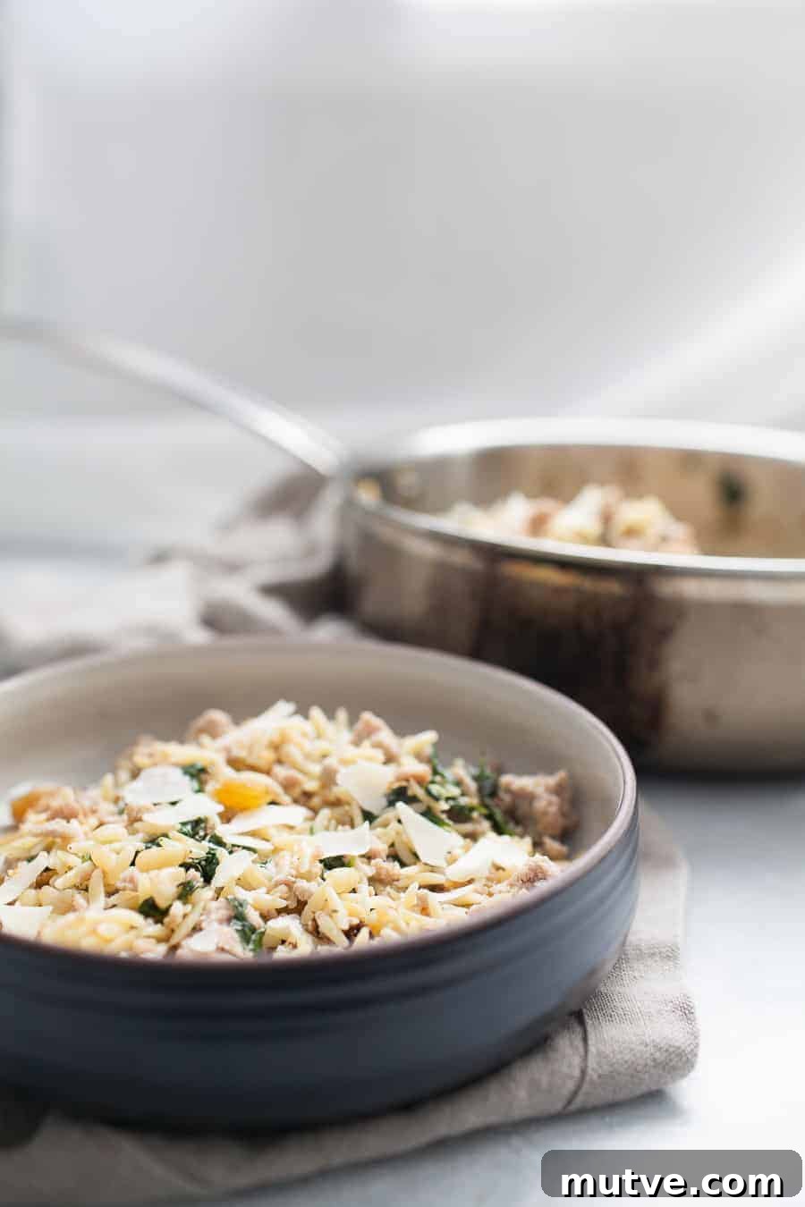 One-Pot Ground Turkey Pasta Recipe 5 A bowl of eggs and spinach on a table.