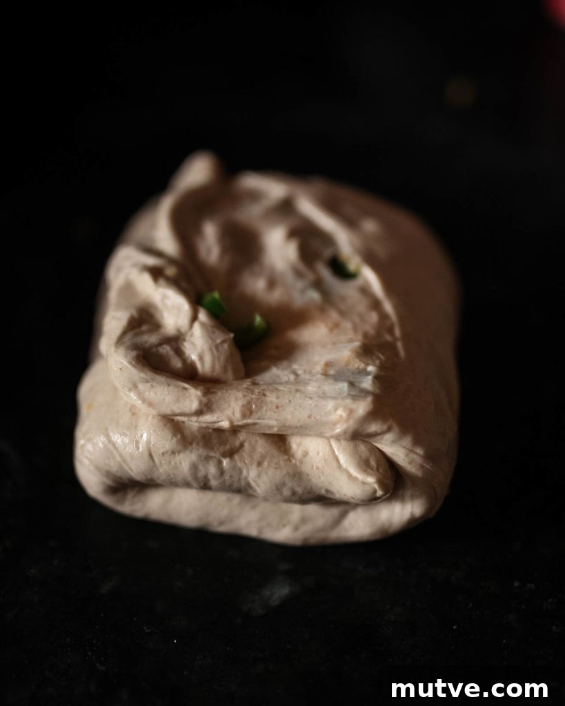 Sourdough Discard Cornmeal Loaf with Cheddar & Jalapeño 5 Lamination - second fold