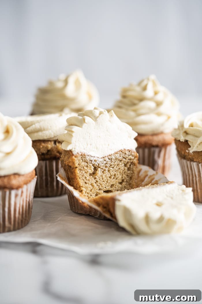 Fluffy Keto Vanilla Cupcakes: Gluten-Free and Paleo 2 Keto vanilla cupcake with buttercream frosting over marble surface
