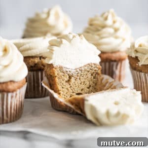 Keto vanilla cupcake with buttercream frosting over marble surface