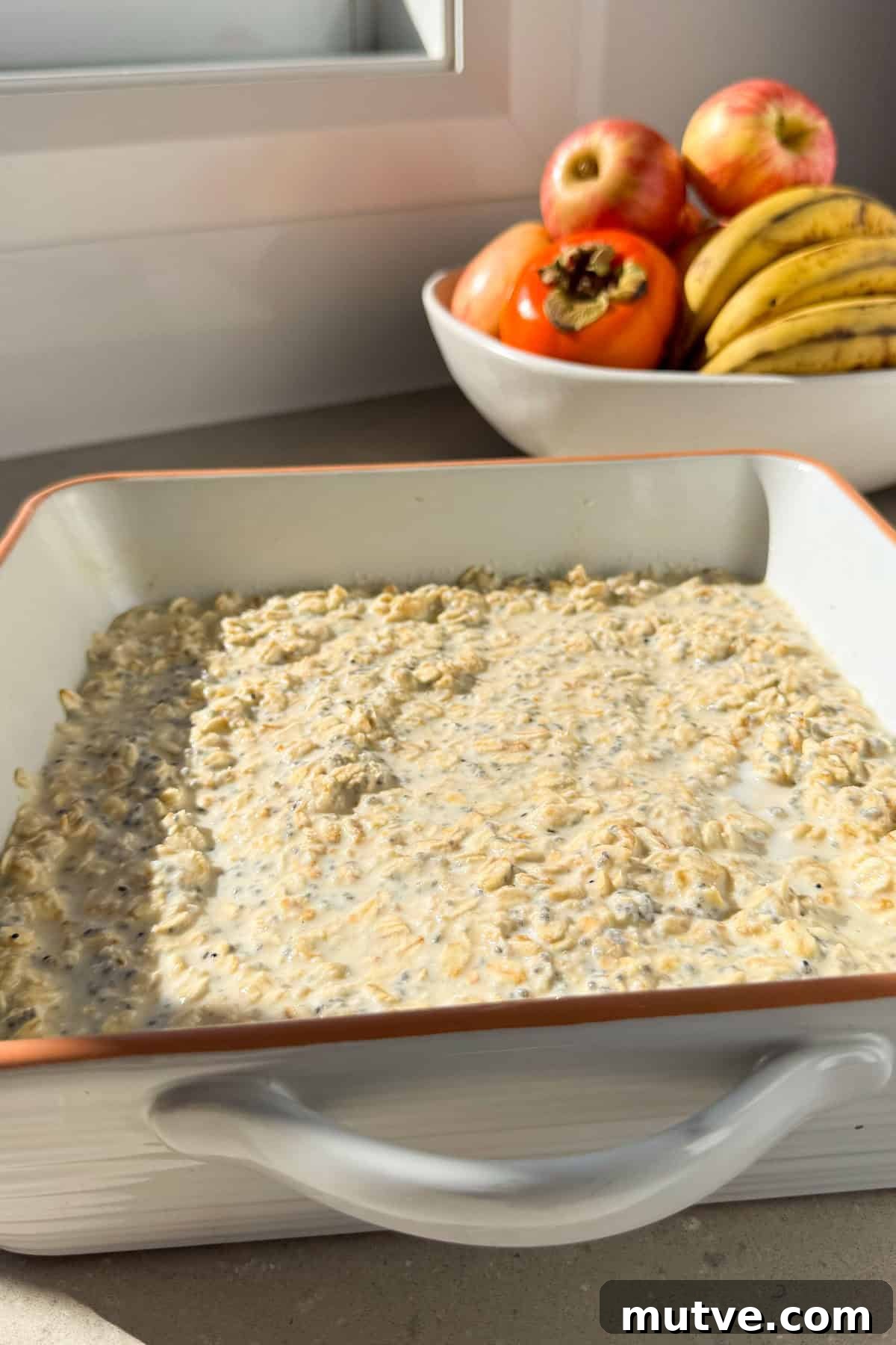 Blackberry Baked Oatmeal Recipe for Breakfast 6 Batter mixed in the baking dish.