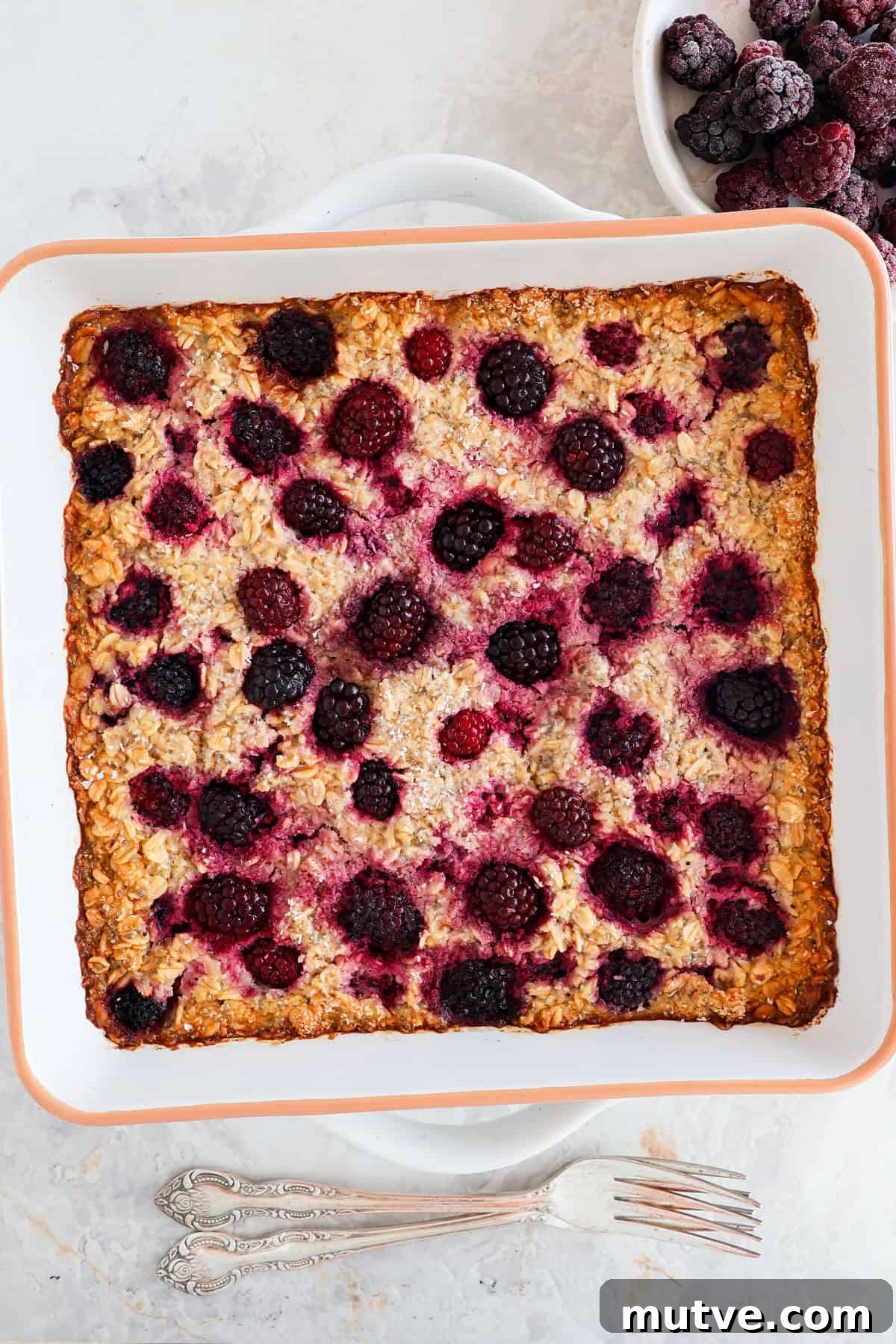Blackberry Baked Oatmeal Recipe for Breakfast 8 Blackberry baked oatmeal in the baking dish.