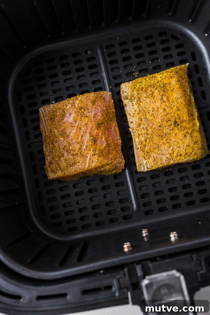 Crispy Air Fryer Mahi Mahi Recipe 7 mahi mahi fillets in the air fryer basket.