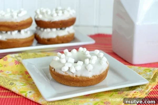 Sweet Potato Donuts - easy baked donuts loaded with spices and topped with white chocolate