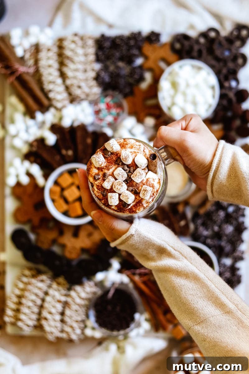 Hot Chocolate Bar Recipes and Ideas for Parties 6 Hot chocolate toppings and treats displayed on a board.