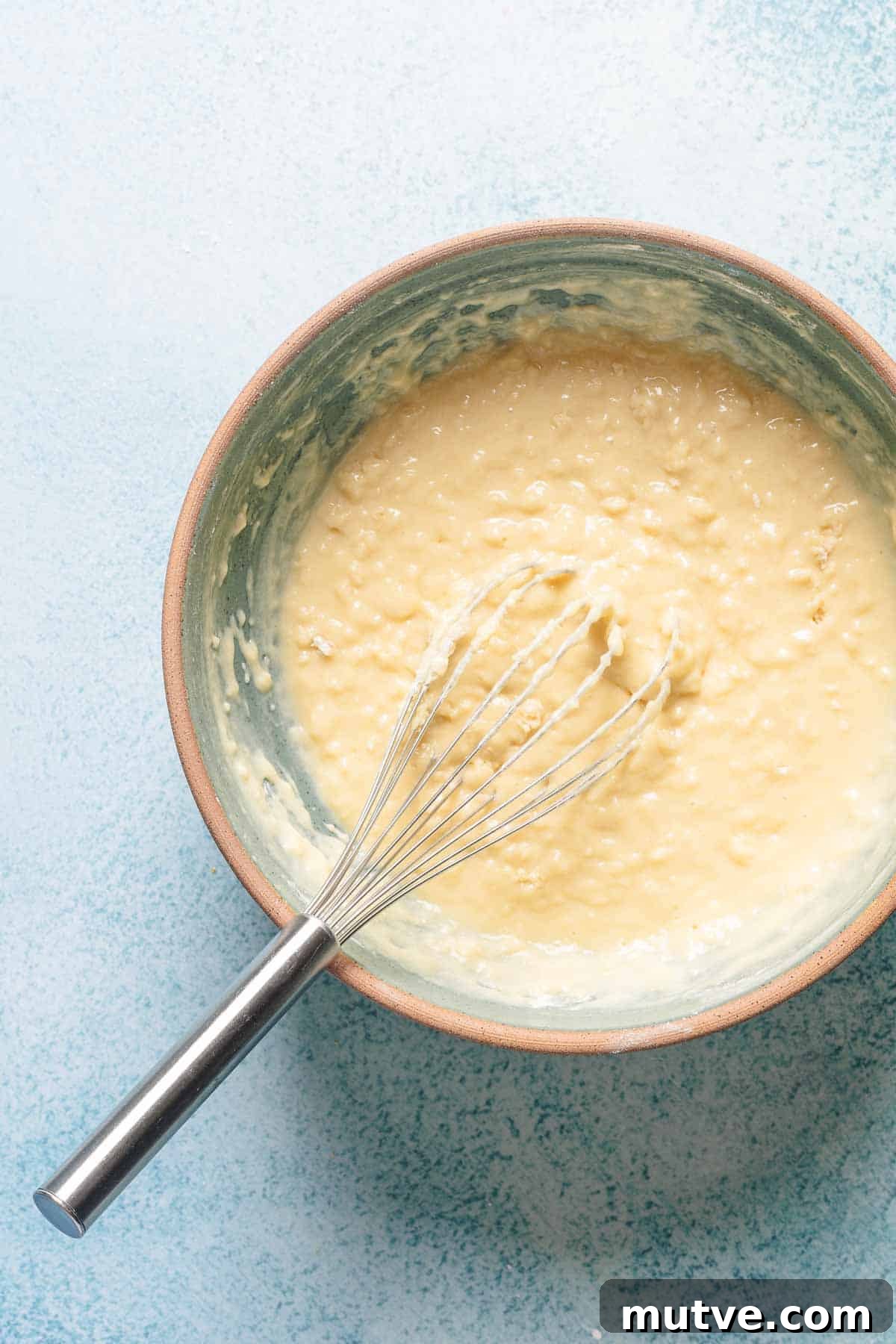 batter in bowl with whisk.