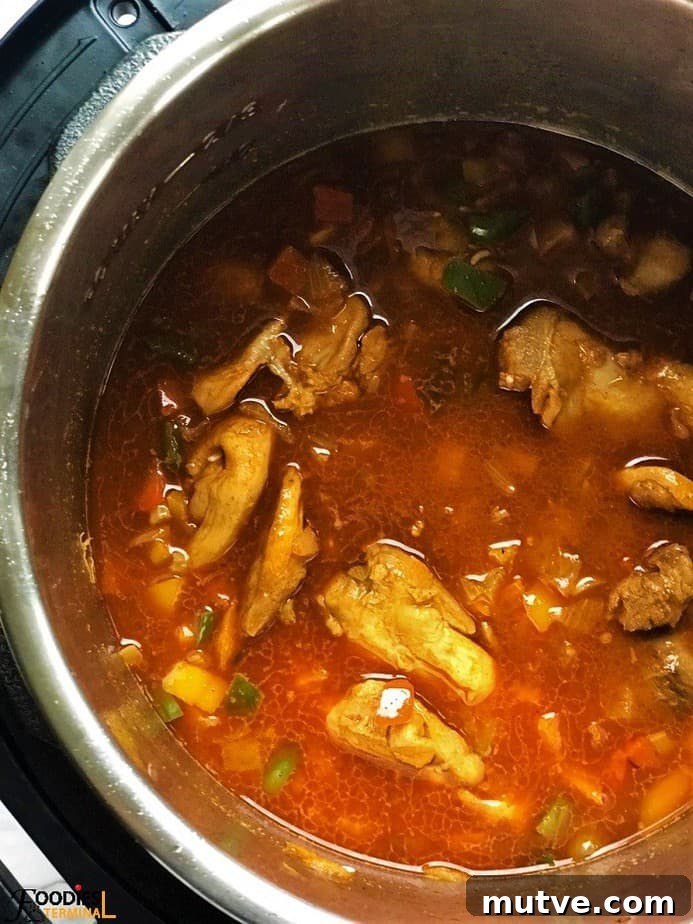 Cajun chicken and rice ready to be pressure cooked in the instant pot