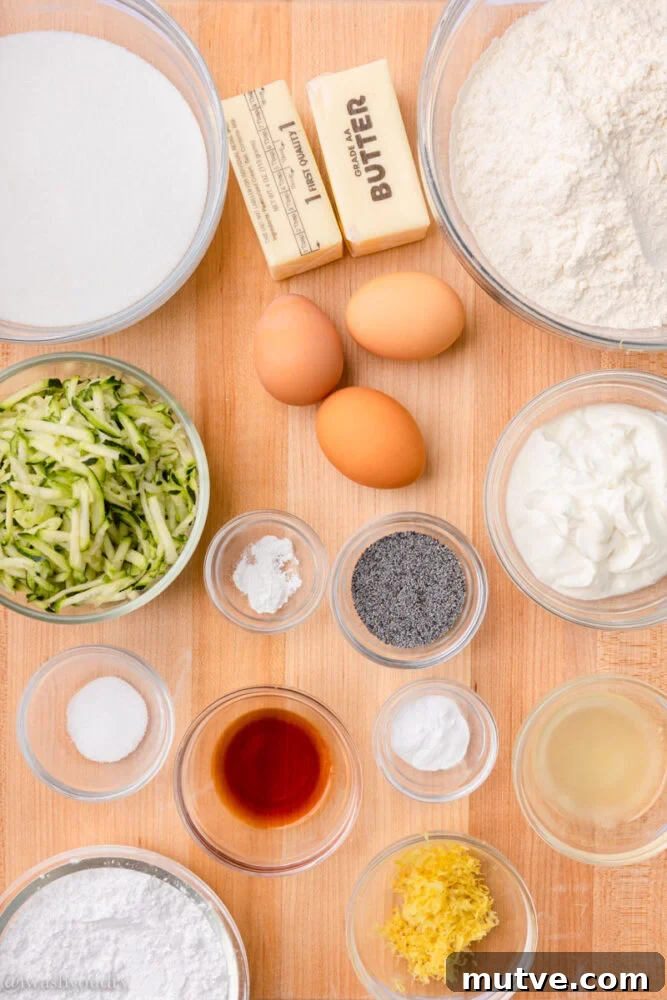 ingredients for zucchini bread on wooden surface.