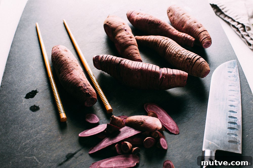 Brown butter and thyme brushed into Hasselback sweet potatoes
