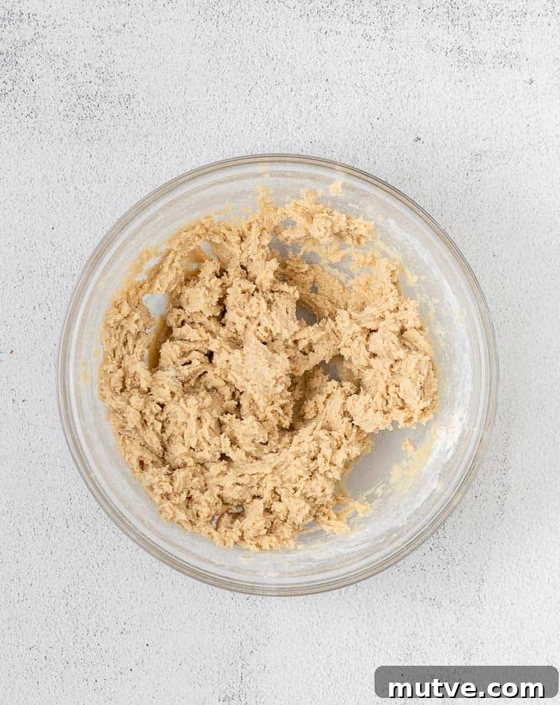 Edible Eggless Cookie Dough Recipe (Safe to Eat Raw) 5 edible cookie dough mixed in a bowl