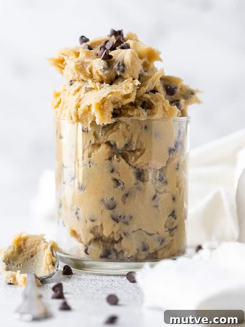 Edible Eggless Cookie Dough Recipe (Safe to Eat Raw) 7 edible cookie dough in a clear glass