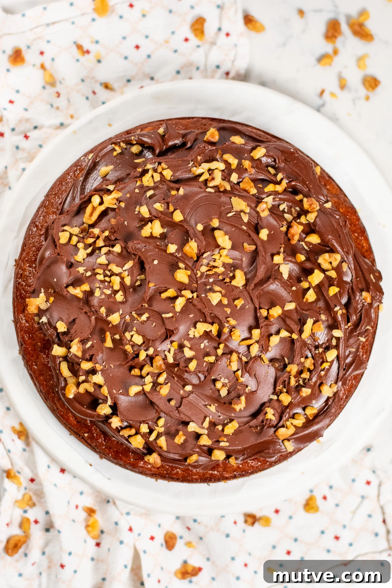 A banana walnut cake with chocolate ganache.