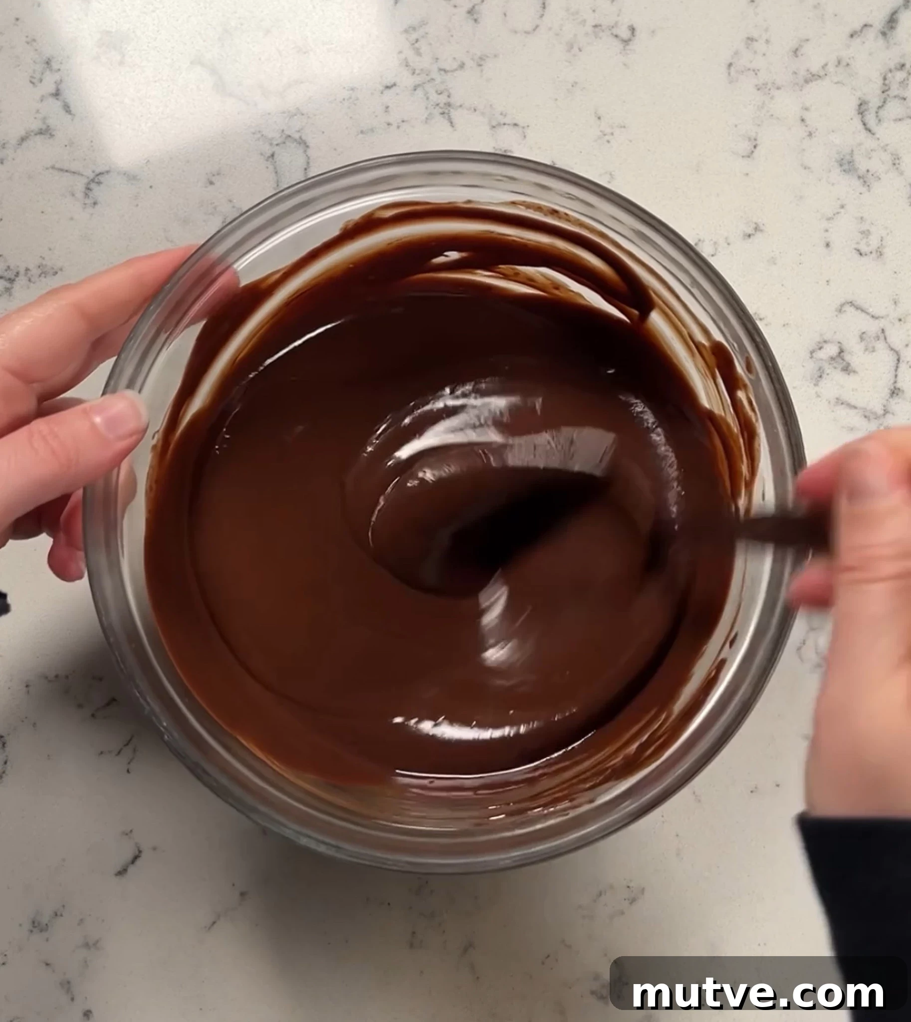 Chocolate ganache in a bowl.