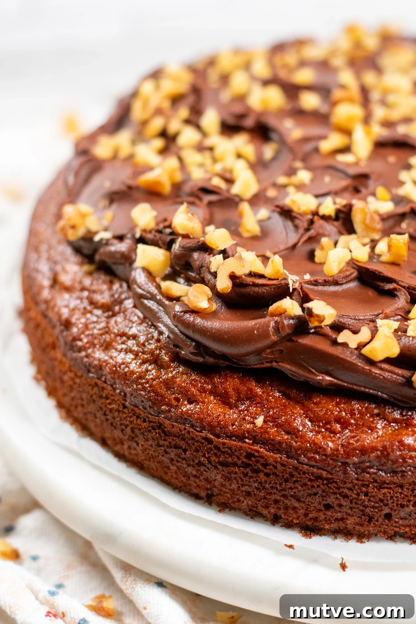 A banana walnut cake with chocolate ganache.