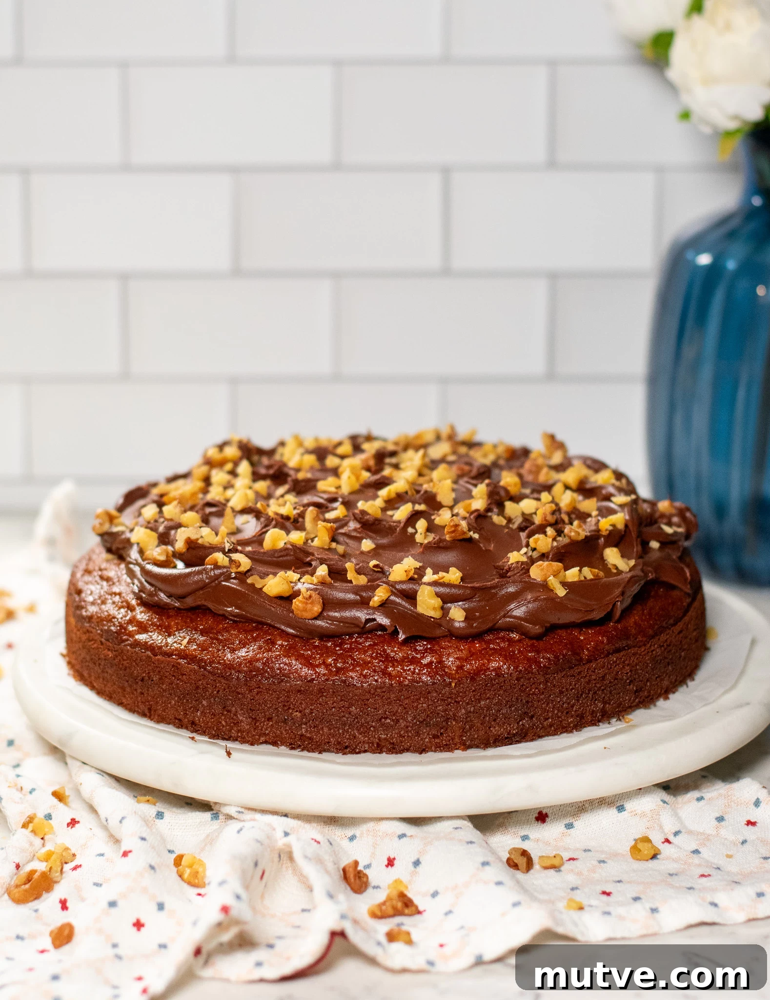 A banana walnut cake with chocolate ganache.
