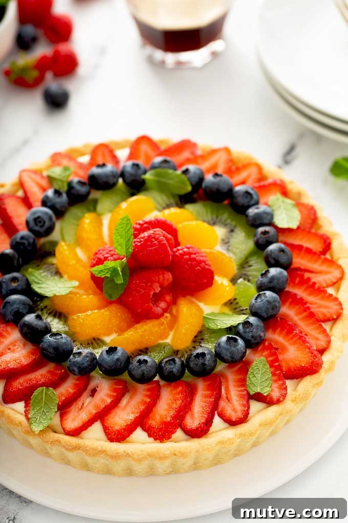 How to Make a Fresh Fruit Tart with Vanilla Custard 4 A close up view of French Tart with fresh fruit topping.