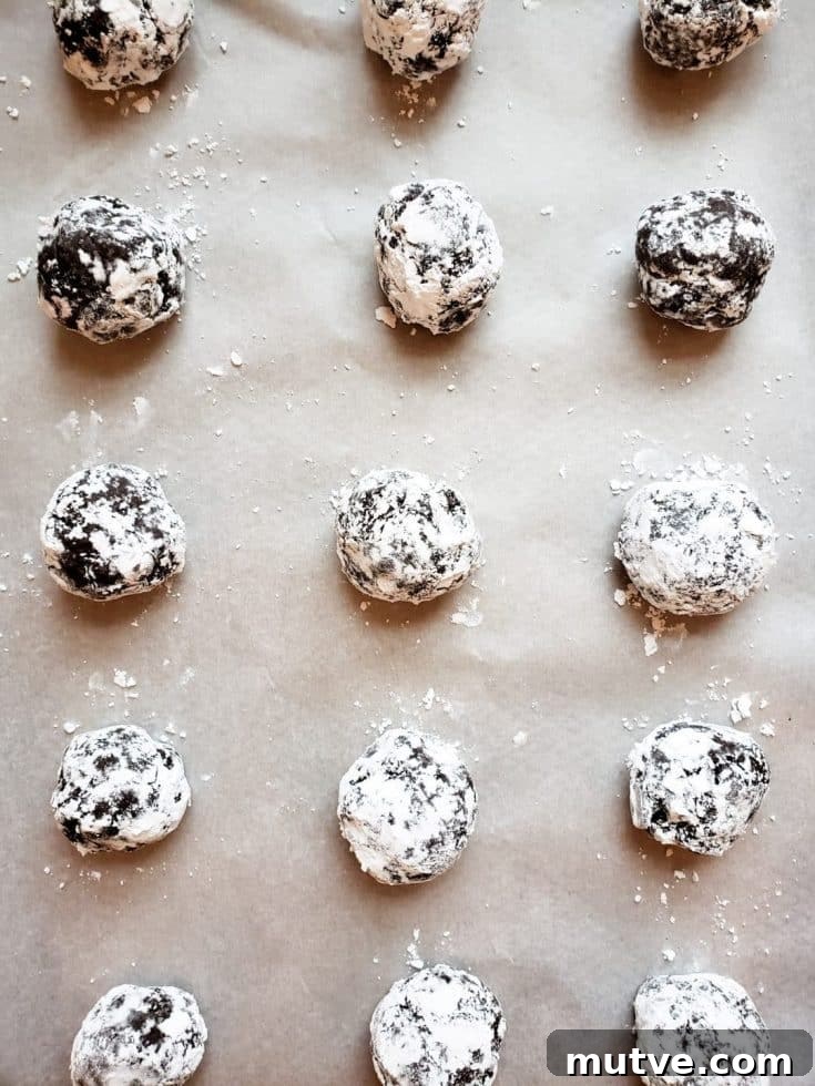 Peppermint Chocolate Cake Cookies 7 Overhead shot of cookie dough balls on parchment paper.