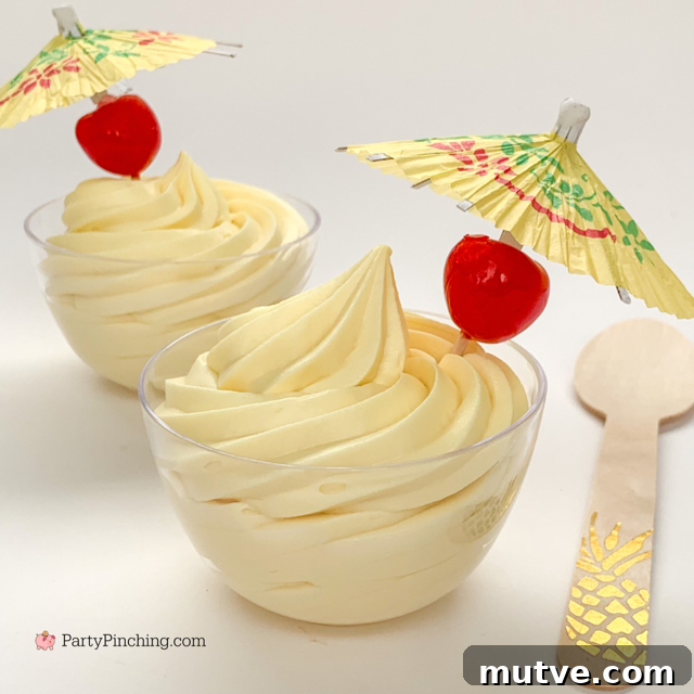 copycat Disney Dole whip recipe, pineapple ice cream homemade, homemade best easy dole whip recipe, 3 ingredients dole whip, dole whip at home, quick and easy dole whip pineapple creamy ice cream with Mickey Mouse ears maraschino cherries drink umbrellas