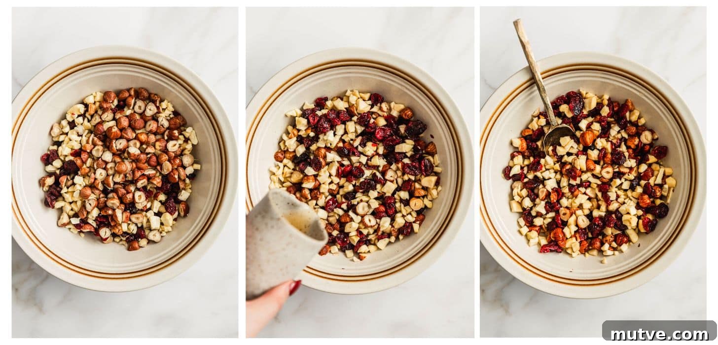 Three steps to macerating fruit. In photo 1, a white bowl filled with dried fruit and nuts is on a white counter. In photo 2, a hand is pouring a white jar of bourbon over the fruit. In photo 3, a gold spoon is stirring the fruit.