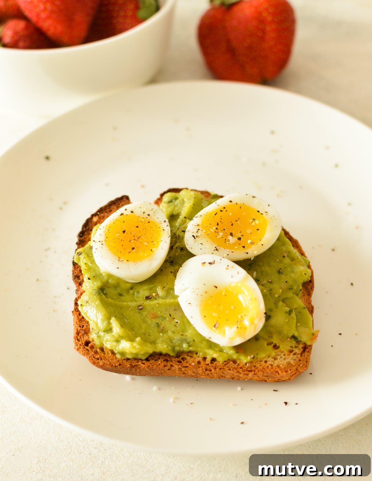 21 Quail Egg Recipes: Breakfast, Lunch and Dinner Ideas 3 soft boiled quail eggs on avocado toast