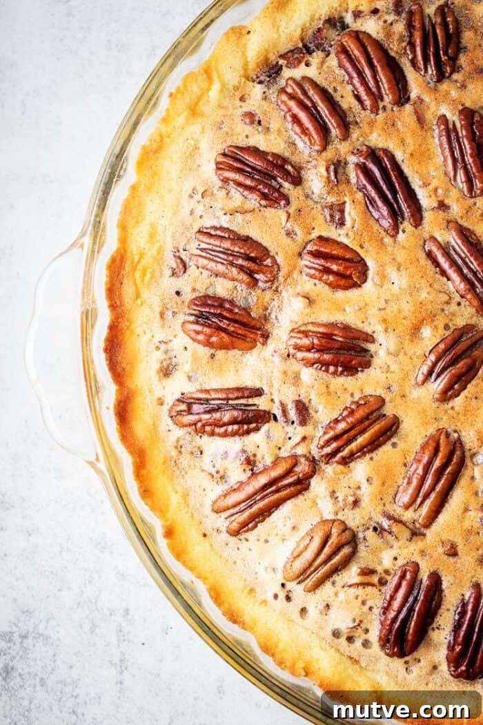 overhead view of keto pecan pie in glass dish