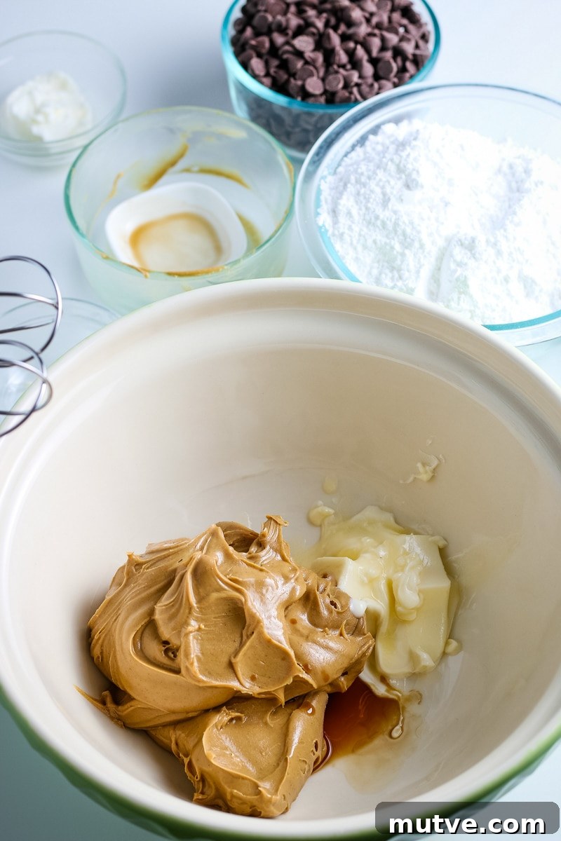 Old Fashioned No Bake Peanut Butter Balls Recipe 4 creamy peanut butter and softened unsalted butter in a mixing bowl.