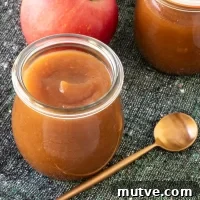 Sweet apple butter in a glass jar.