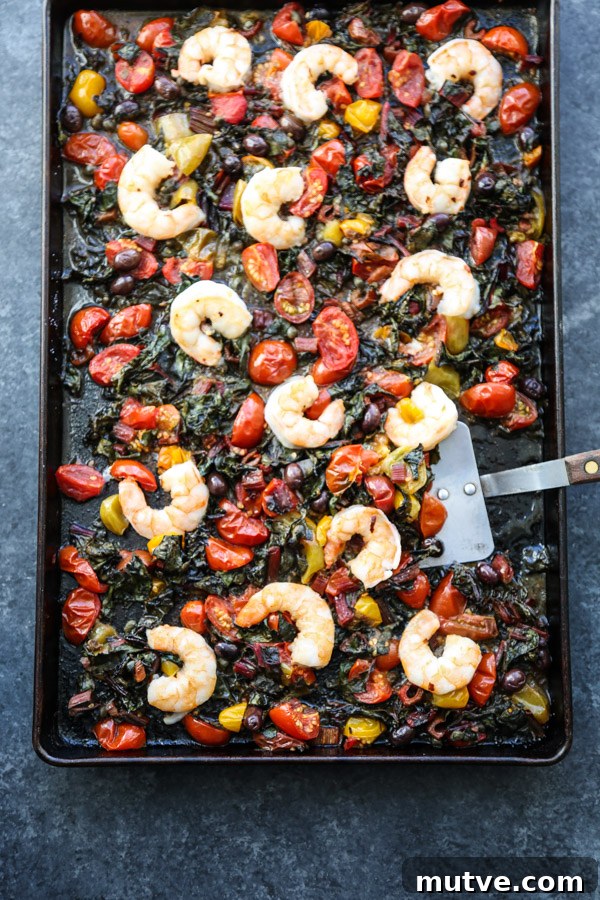 Sheet Pan Shrimp Puttanesca with Chard and Cherry Tomatoes 6 Served bowl of shrimp, tomatoes and chard
