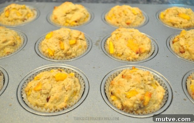 Peach Jam Muffins -The Grateful Girl Cooks! Baked peach jam muffins, hot out of oven.