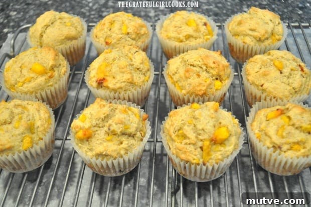 Peach Jam Muffins -The Grateful Girl Cooks! Peach jam muffins cool down on wire rack before adding glaze.