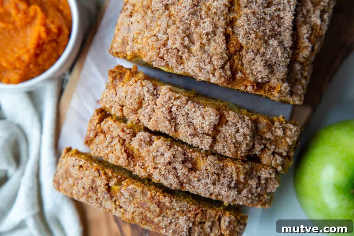 Cinnamon-Spiced Pumpkin Apple Bread 10 sliced pumpkin apple bread topped with cinnamon streusel.