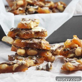5 Last-Minute Chocolate Gift Ideas for Chocolate Lovers 3 A stack of chocolate nut brittle on baking paper.