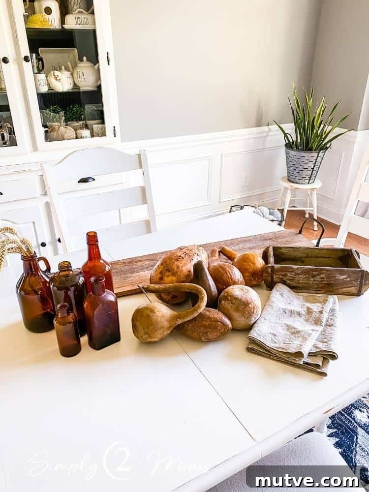 Supplies for a rustic centerpiece arranged on a dining table