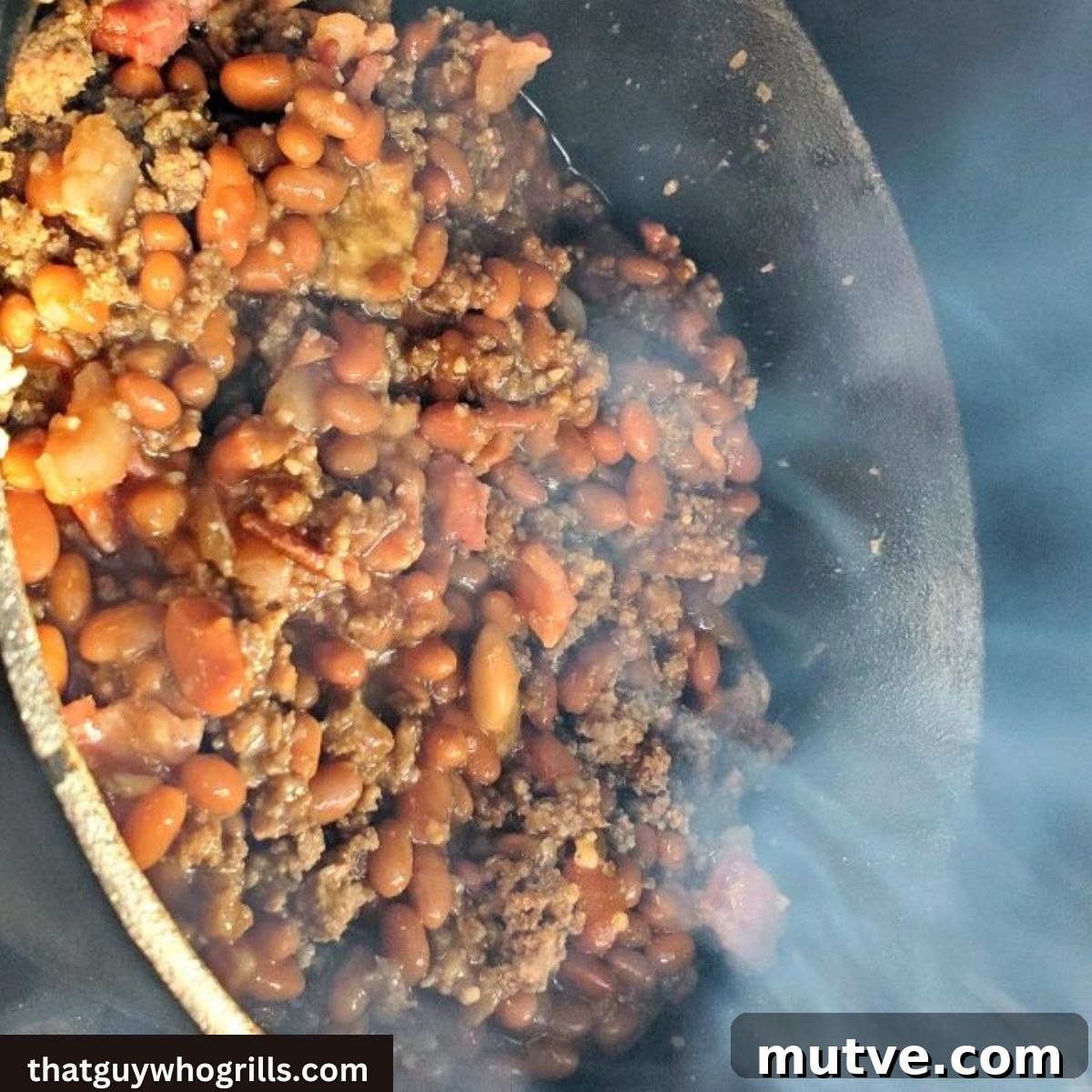 Smoked Loaded Baked Beans Recipe in a Cast Iron Dutch Oven 4 Smoked Baked Beans Smoking in a dutch oven in a smoker