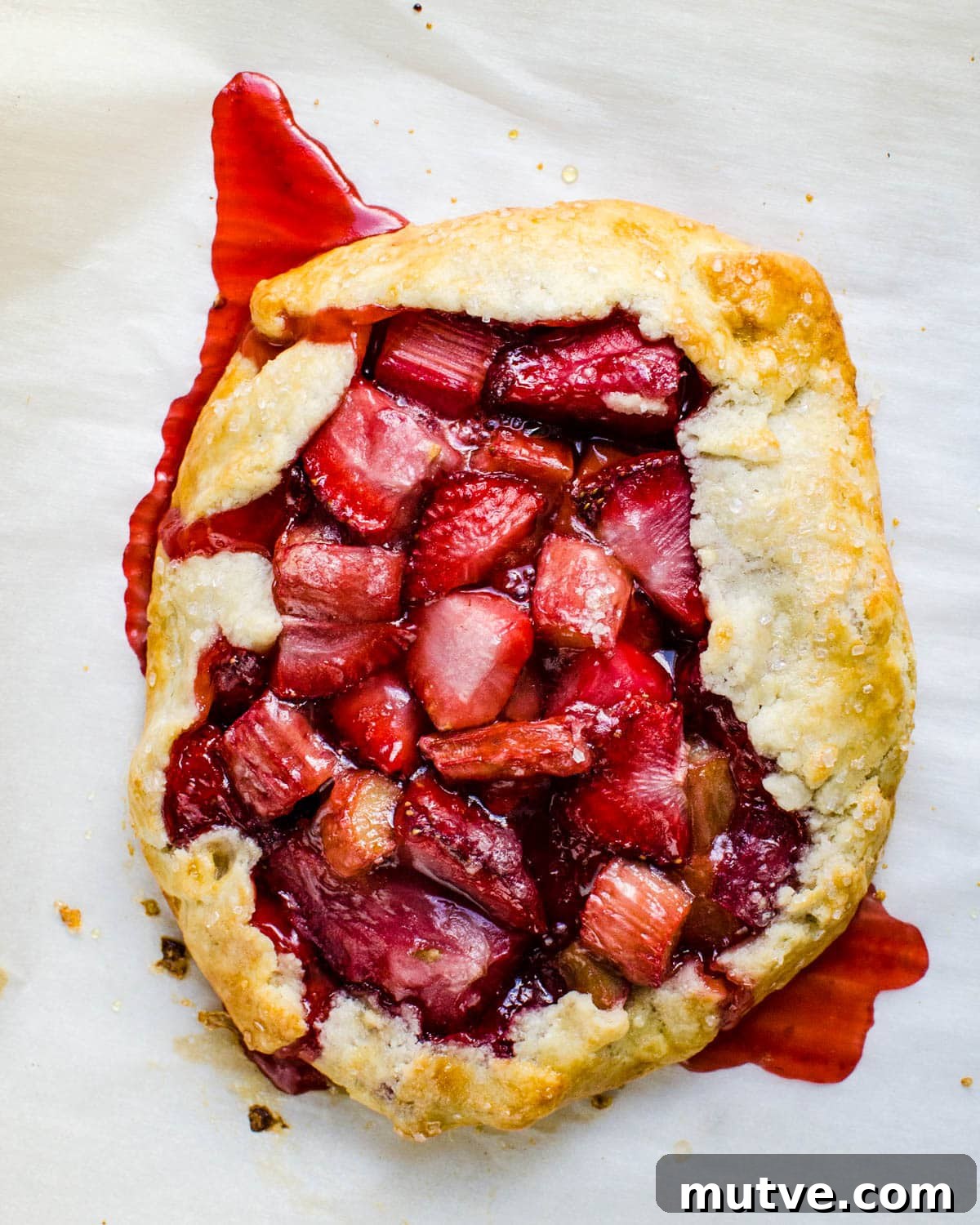 Rustic Strawberry Rhubarb Galette with Flaky Crust 12 Baked strawberry rhubarb galette.
