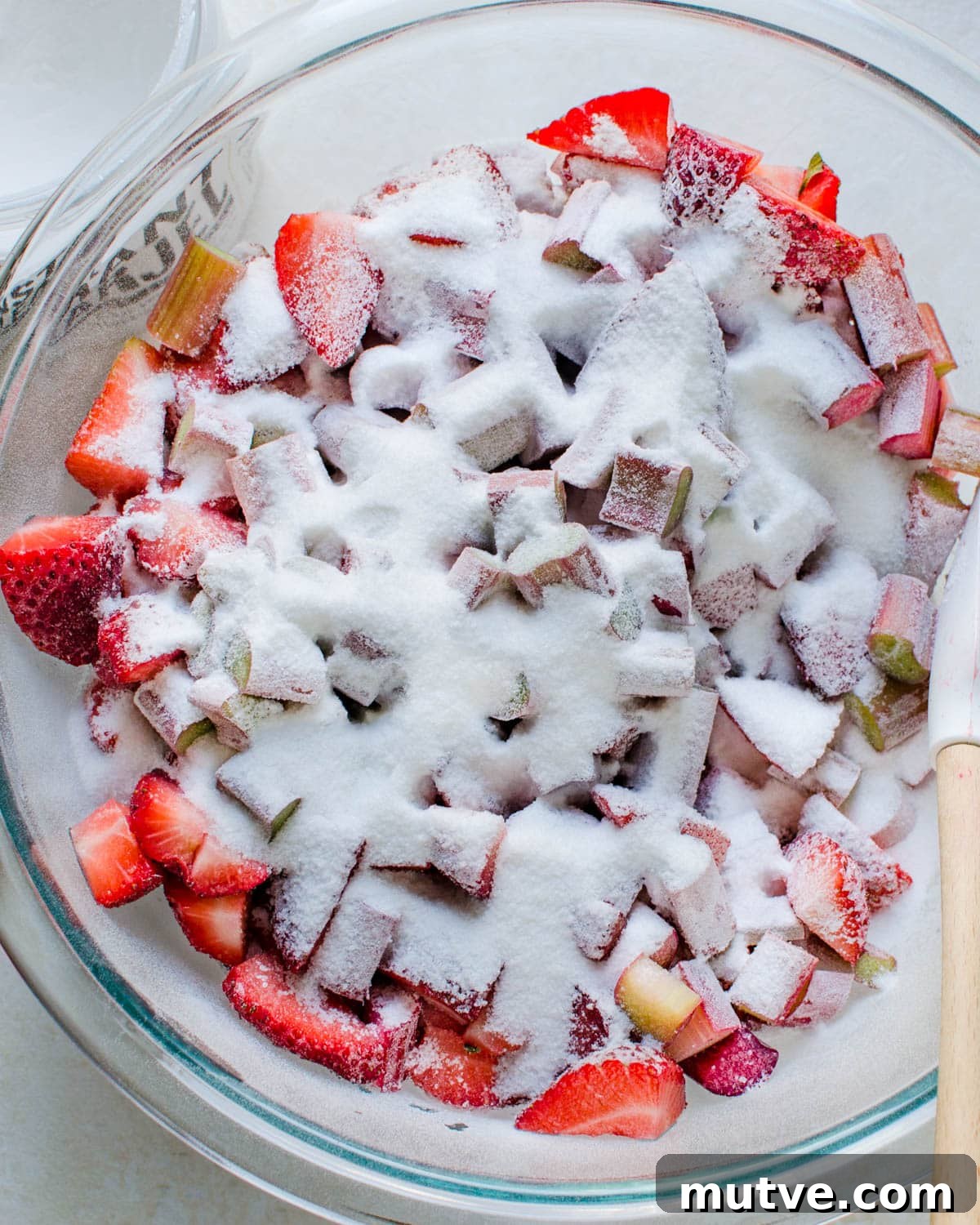 Rustic Strawberry Rhubarb Galette with Flaky Crust 5 Adding instant clear jel to the strawberries and rhubarb.