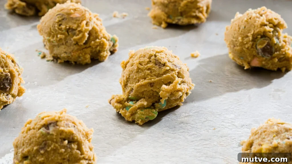 Easter cookies on a baking sheet ready for the oven.