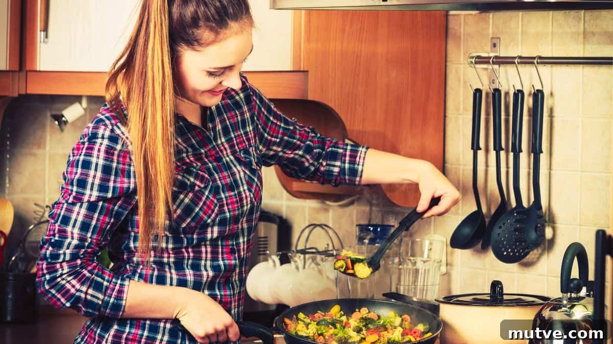woman cooking with vegetables in the kitchen