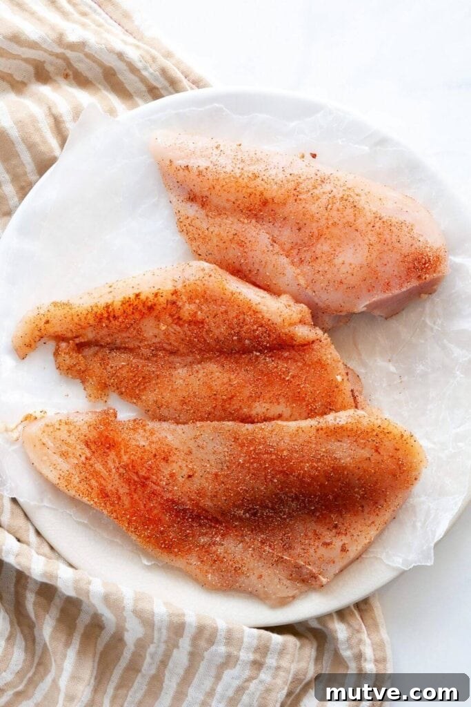 Air Fryer BBQ Chicken Breasts Recipe 4 seasoning three chicken breasts with dry rub