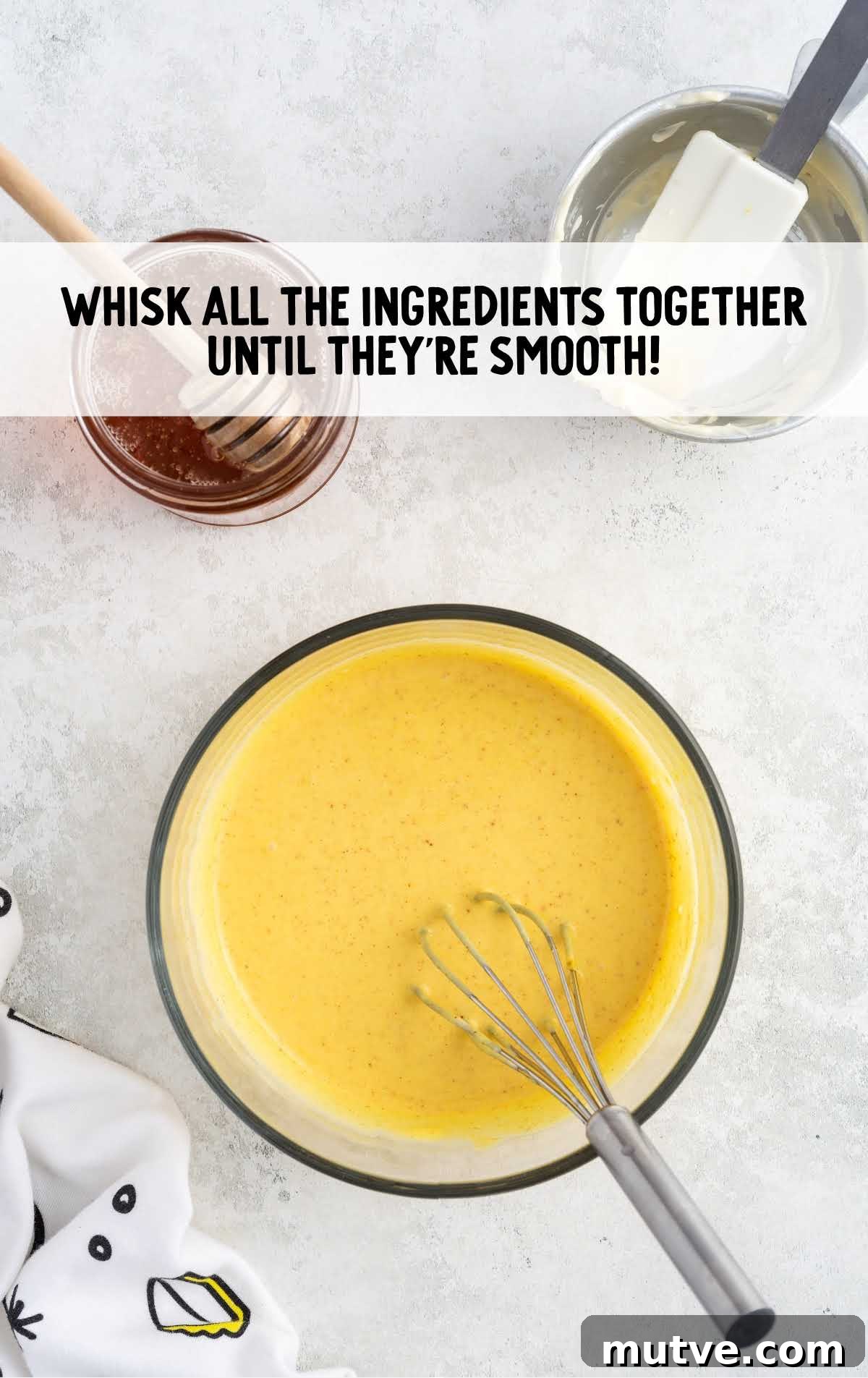 Homemade Honey Mustard Dipping Sauce 5 ingredients whisked together in a bowl