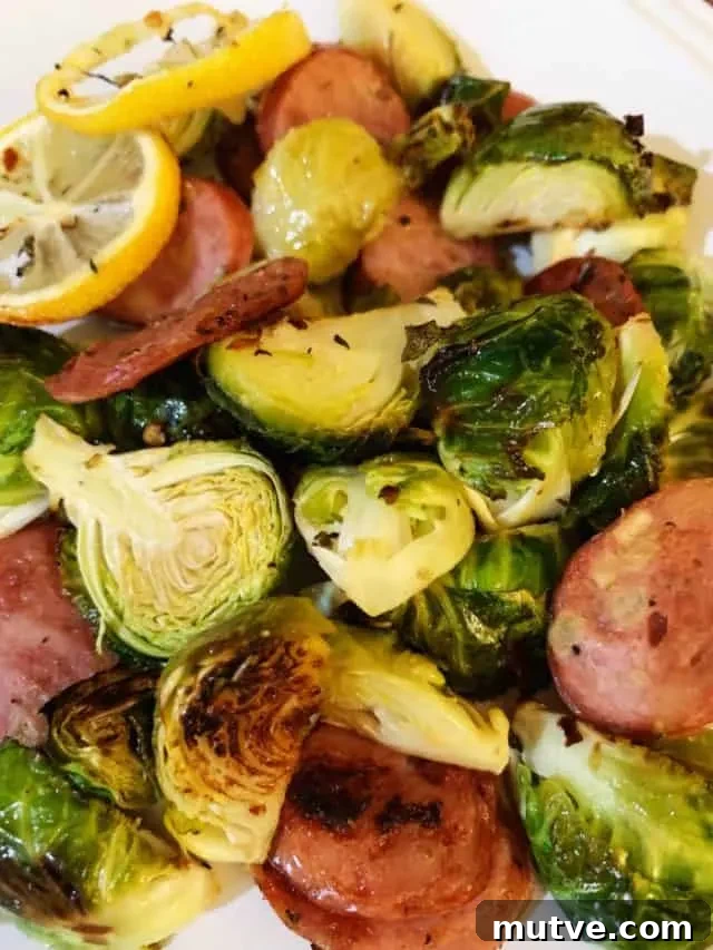 Sheet Pan Sausage and Roasted Brussels Sprouts 7 plate of sausage and brussels sprouts sheet pan