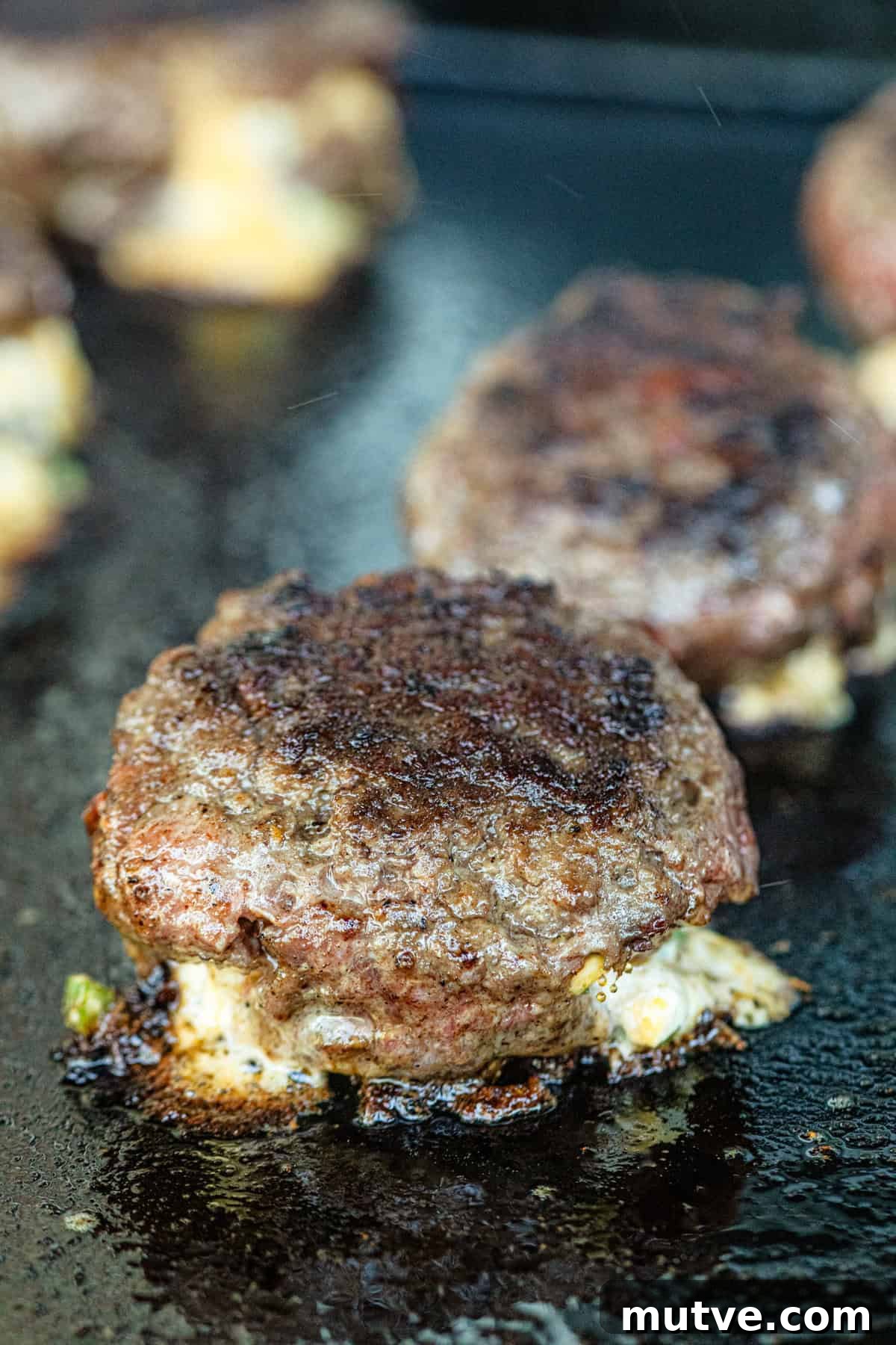 Juicy Jalapeno Popper Stuffed Burger with Bacon and Cream Cheese 9 Jalapeno Popper Stuffed Burger on Blackstone