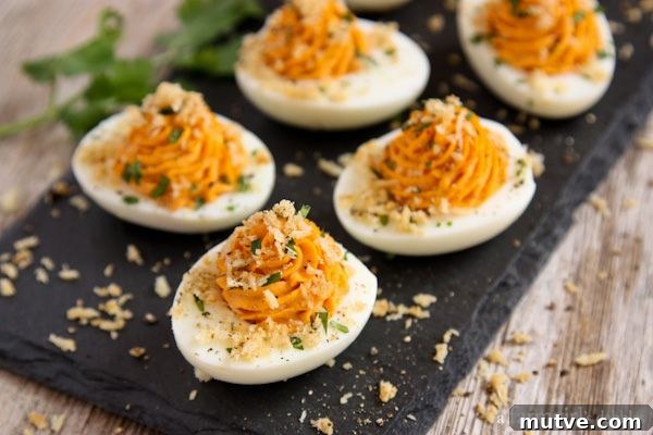 25+ Deviled Egg Recipes for Parties, Holidays and Potlucks 19 Sriracha Deviled Eggs with Garlic Toast Crumb Topping | 25+ Deviled Egg Recipes
