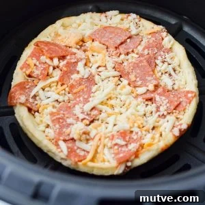 A close up of a frozen mini pizza.