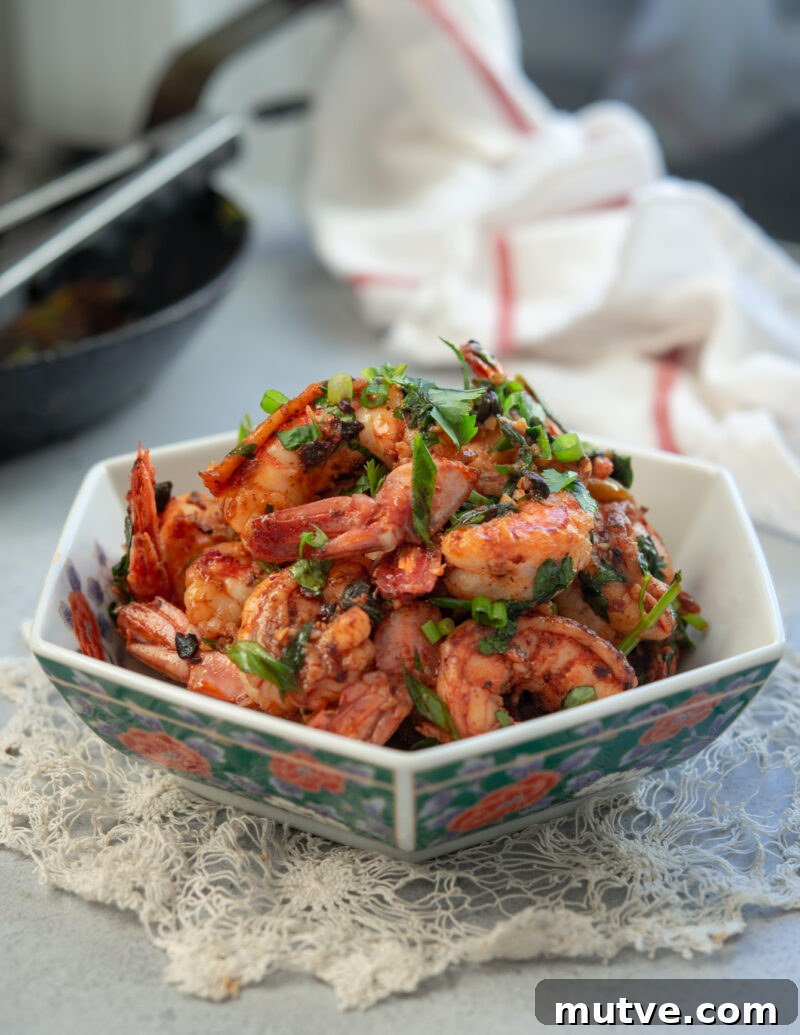 Quick Chili Garlic Shrimp with Chili Crisp Recipe 2 A bowl of chili garlic shrimp is made with Chinese chili crisp.