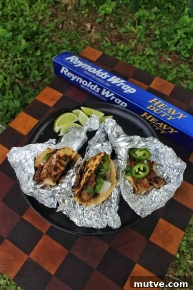Grilled Steak Tacos with Mexican Street Corn and Cotija 12 Smoked Carnitas Tacos