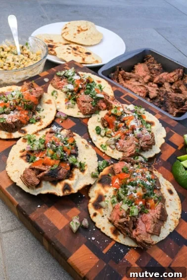 Grilled Steak Tacos with Mexican Street Corn and Cotija 14 Steak tacos ready to eat