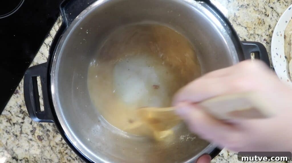 Creamy Instant Pot Chicken Baconara Pasta 15 Deglazing pot
