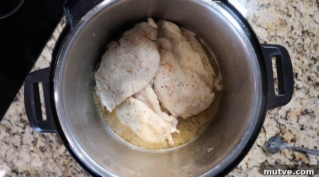 Creamy Instant Pot Chicken Baconara Pasta 16 Returning chicken to the pot